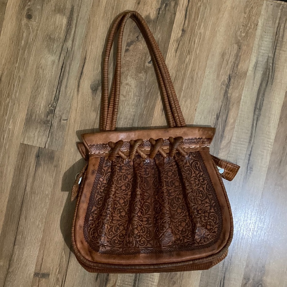 Brown leather purse from my trip in Portugal.